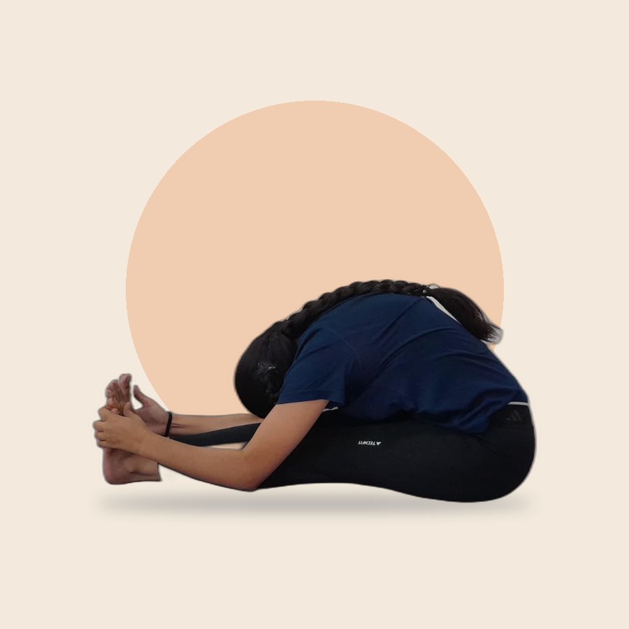 Paschimottanasana, seated forward bend